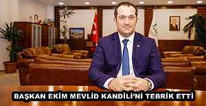 BAŞKAN EKİM MEVLİD KANDİLİ’Nİ TEBRİK ETTİ